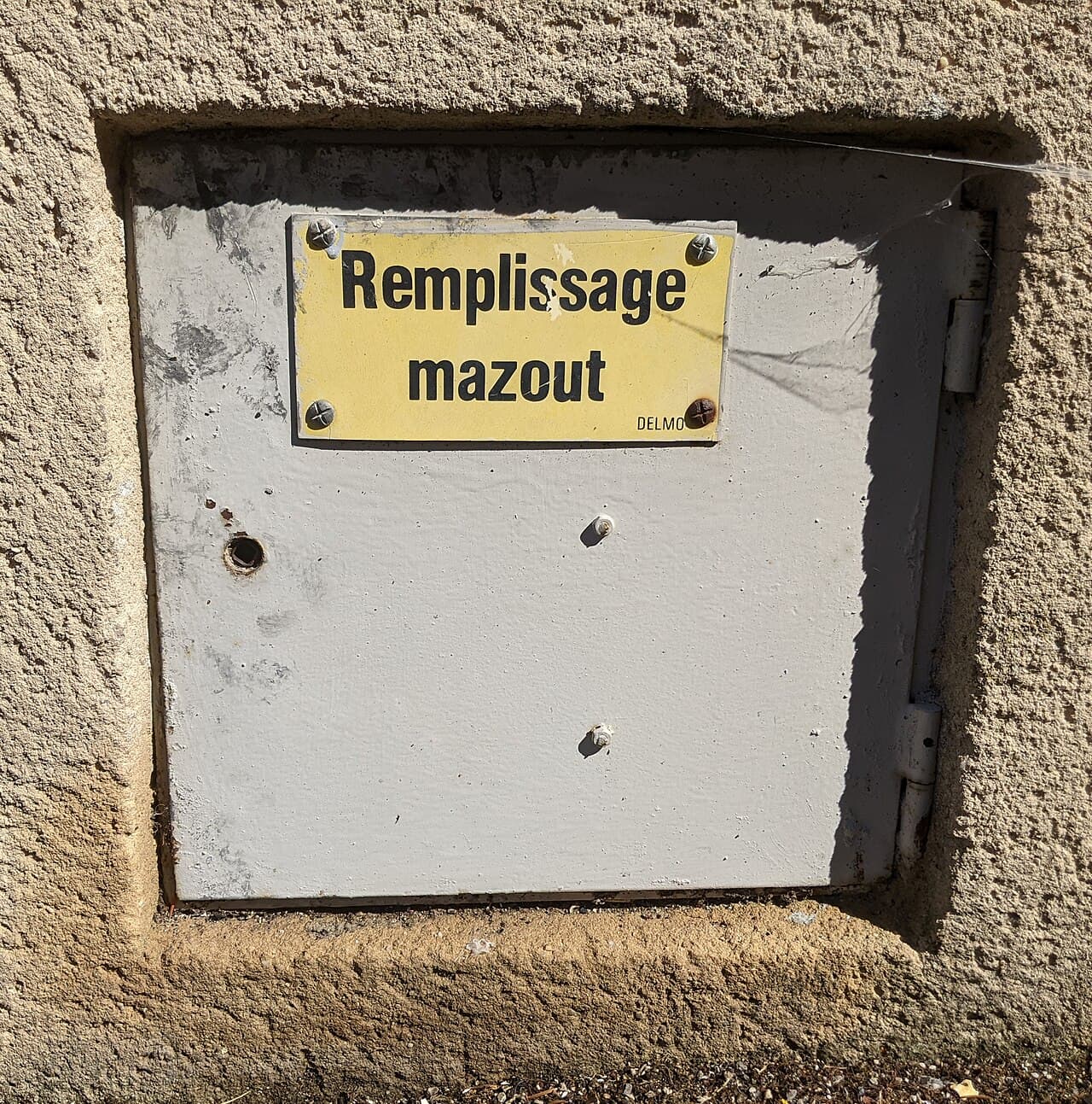 Plaque indiquant un remplissage de mazout